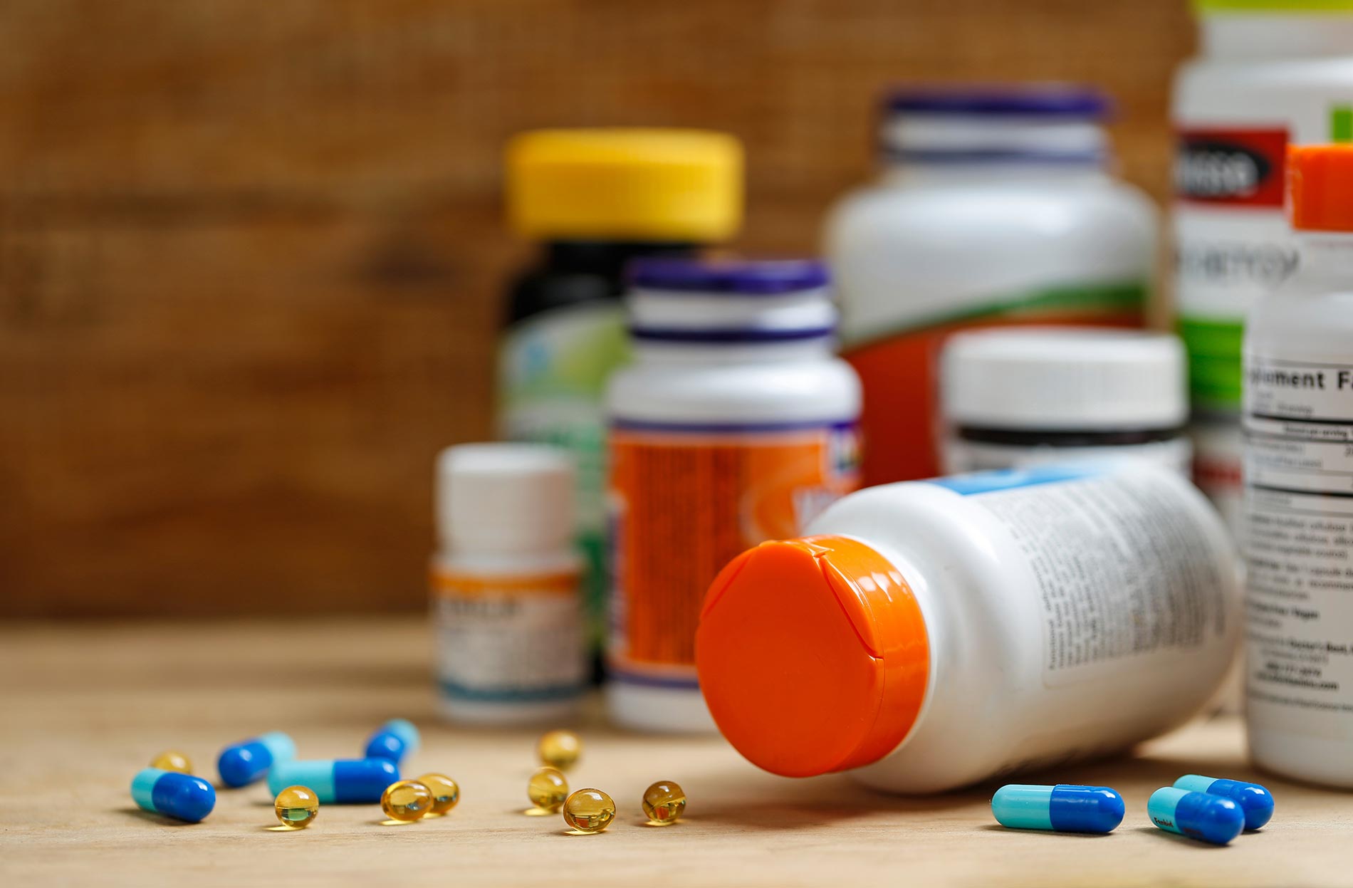Vitamins and supplements on a pharmacy shelf